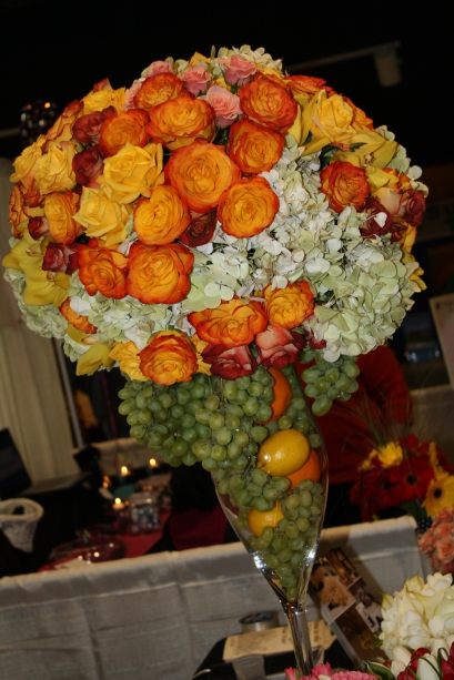 Including fruit in the buffet centerpiece is a lovely way to compliment the