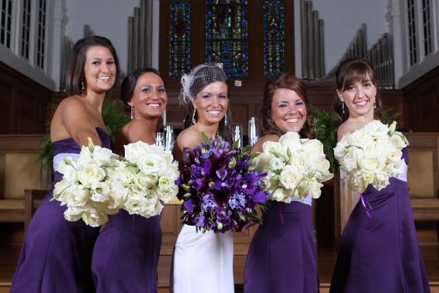 Purple and cream wedding bouquets These vintage bouquets are purple and
